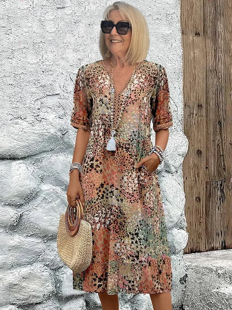Sophia - Elegant maxi dress with playful floral print