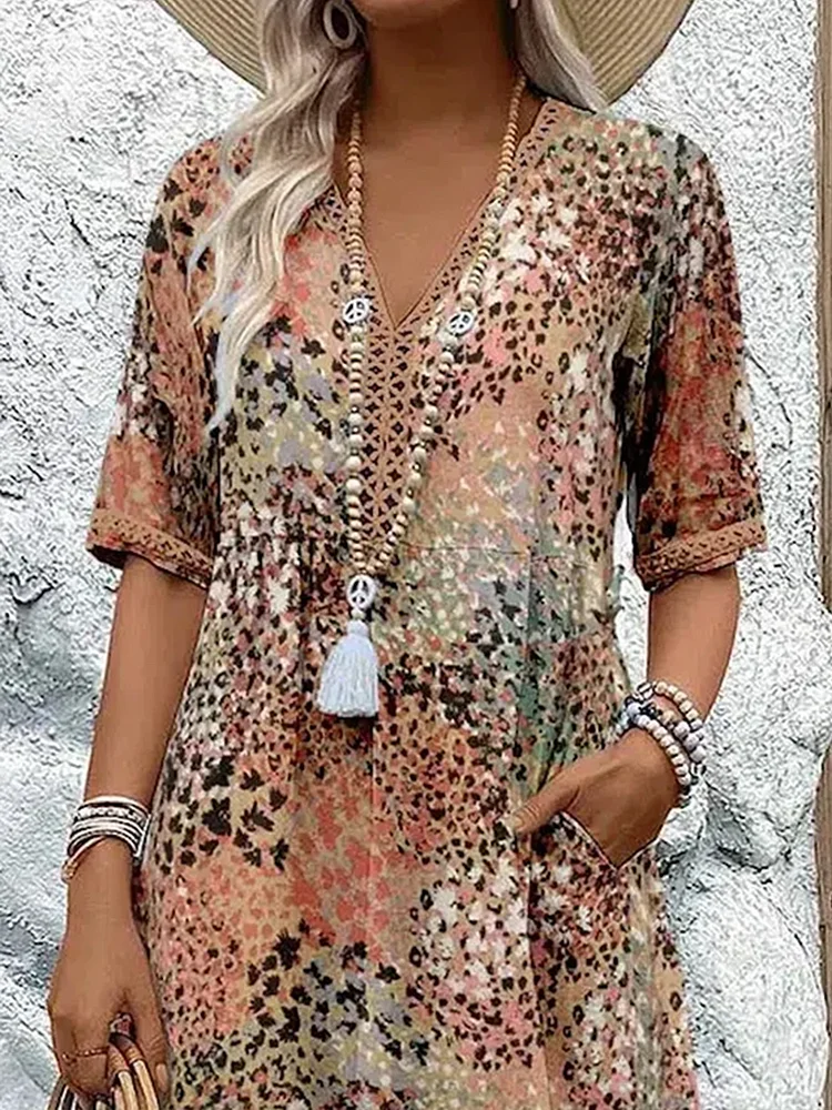Sophia - Elegant maxi dress with playful floral print