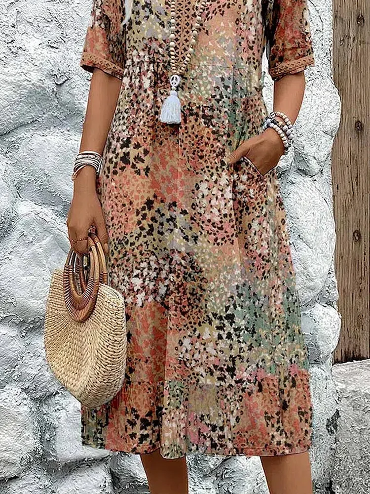 Sophia - Elegant maxi dress with playful floral print