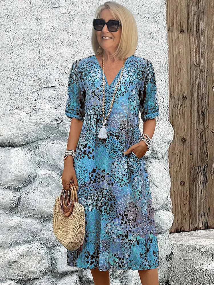Sophia - Elegant maxi dress with playful floral print