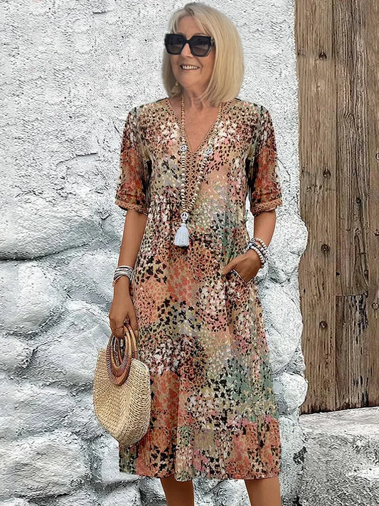 Sophia - Elegant maxi dress with playful floral print